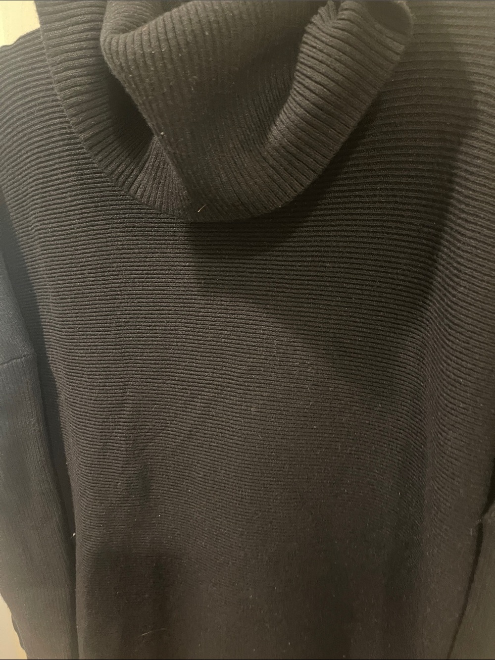 Woman’s  Black Ribbed Turtleneck Sweater